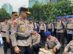 wakapolda-metro-jaya-brigjen-suyudi-ario-seto-memimpin-apel-pengecekan-pasukan-pengamanan-tps-pemilu-2024_169